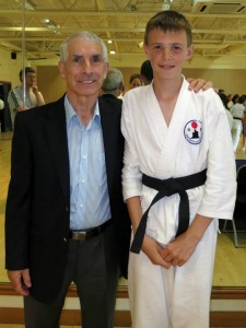 Adam receiving his Black Belt from Sensie Andy Shery